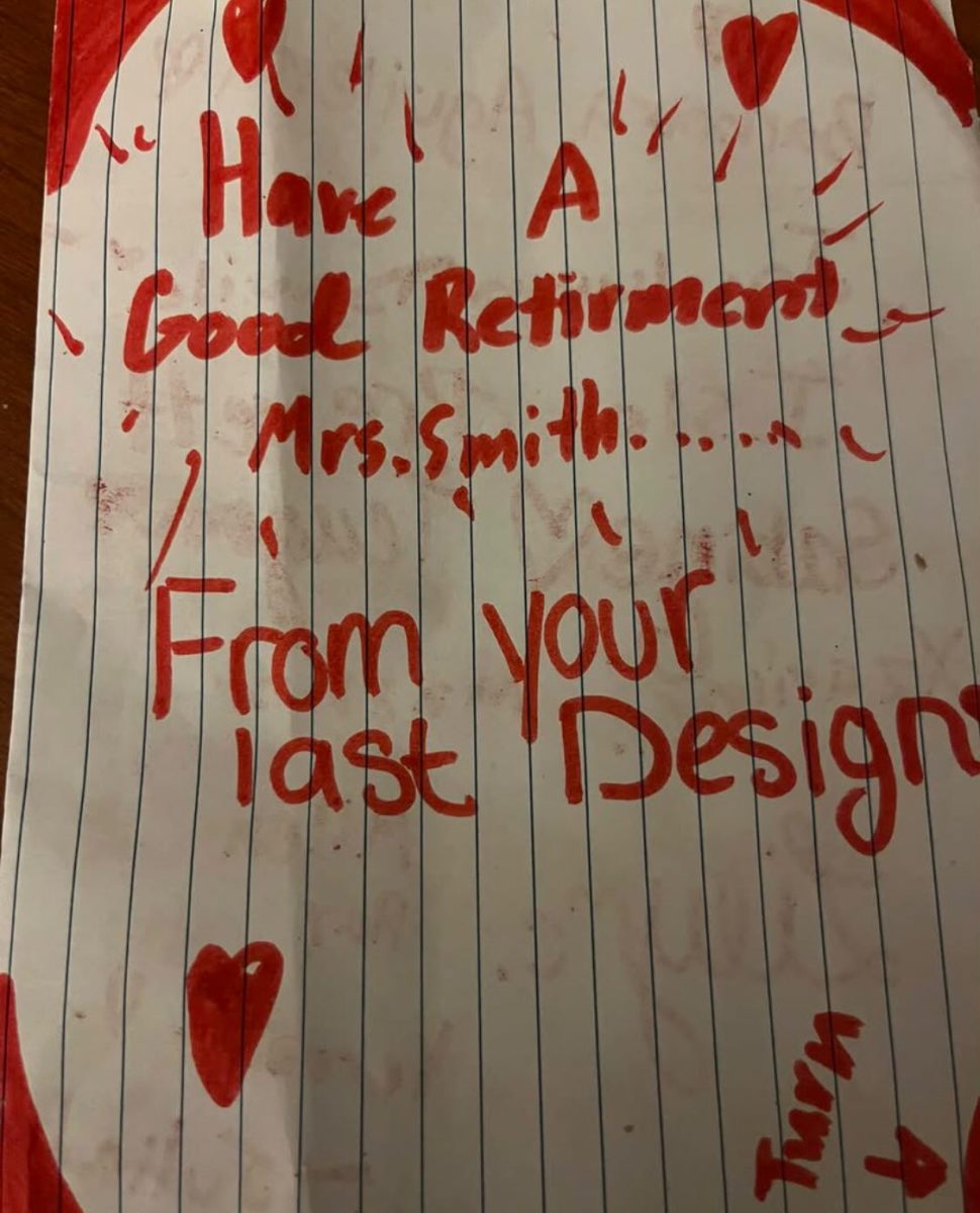 Baker Middle School students in Mrs. Smith's design period wish her farewell. Design is the equivalent of a study hall or free period, being a space where students could relax and collaborate, making Mrs. Smith’s time with them especially memorable