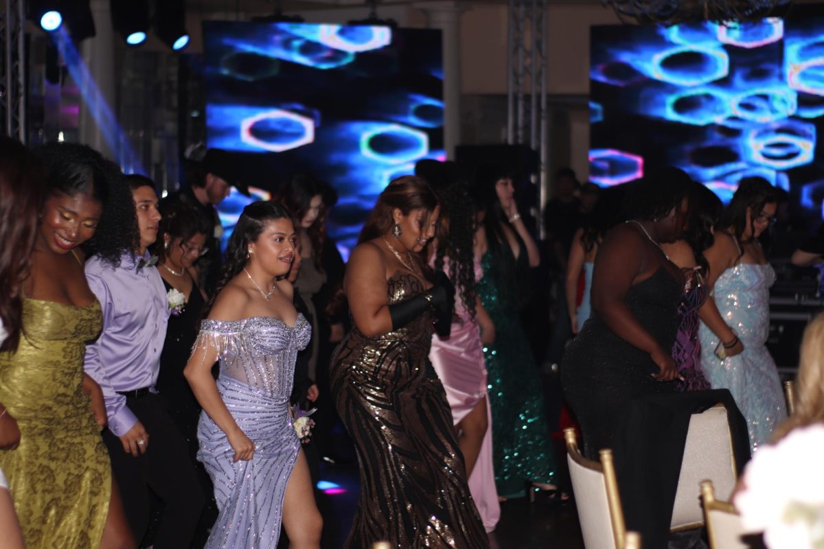 A dance favorite — seniors line up for the "Cupid Shuffle." Senior Prom was celebrated at the Corpus Christi Country Club on April 5. 