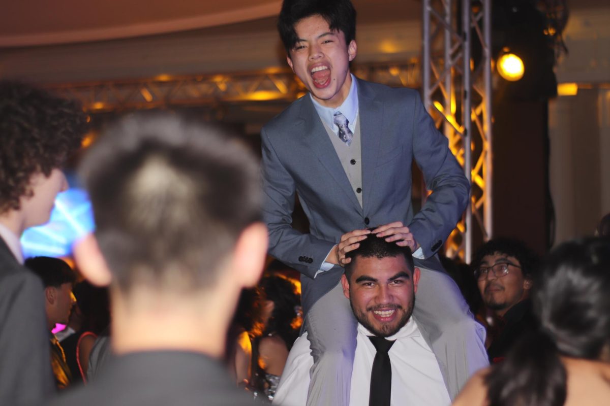 Senior Seth Alfaro emerges above the crowd, singing his heart out at the Ray HS 2025 Senior Prom. Senior Prom was celebrated at the Corpus Christi Country Club on April 5. 