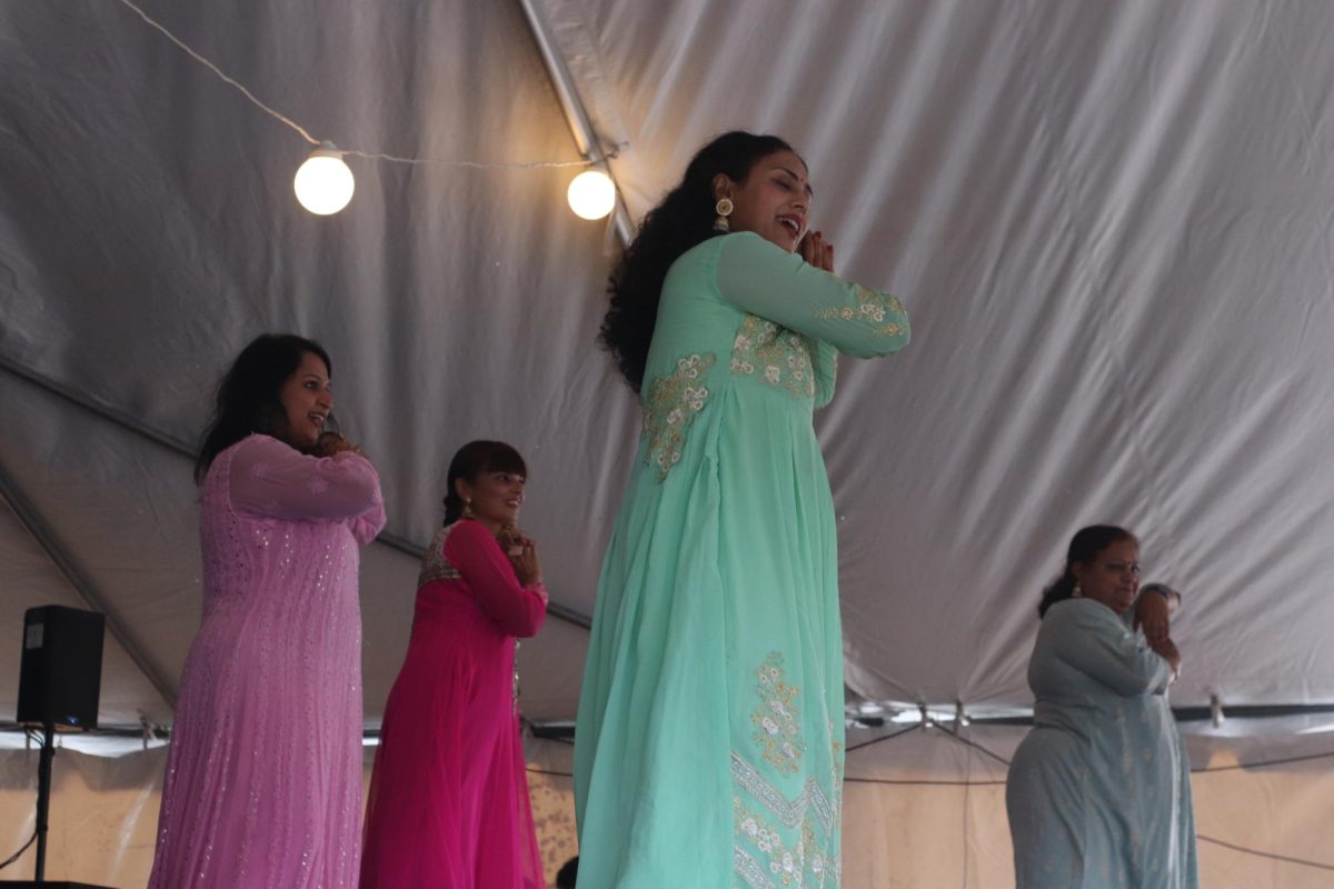 Dancers perform a medley which showcases a woman’s cultural journey, towards the end of the 16th Annual Community Health Fair and Festival of India’s cultural program. The festival was hosted by South Texas Hindu Society at the Sri Venkateswara Temple last Saturday on Sep. 15.