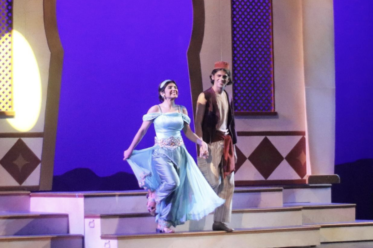 RHS senior Priscilla Mir, as Princess Jasmine, walks onto the stage with her co-star, Miller High School senior Austin Martinez, as Prince Ali during the curtain call for CCISD’s districtwide musical “Aladdin Jr.”. Throughout high school, Mir has been active in theater and Speech and Debate.
